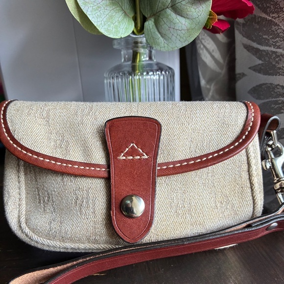 Dooney Bourke Handbags - Dooney & Bourke wristlet,Canvas and Brown Leather-Trim Wristlet Clutch